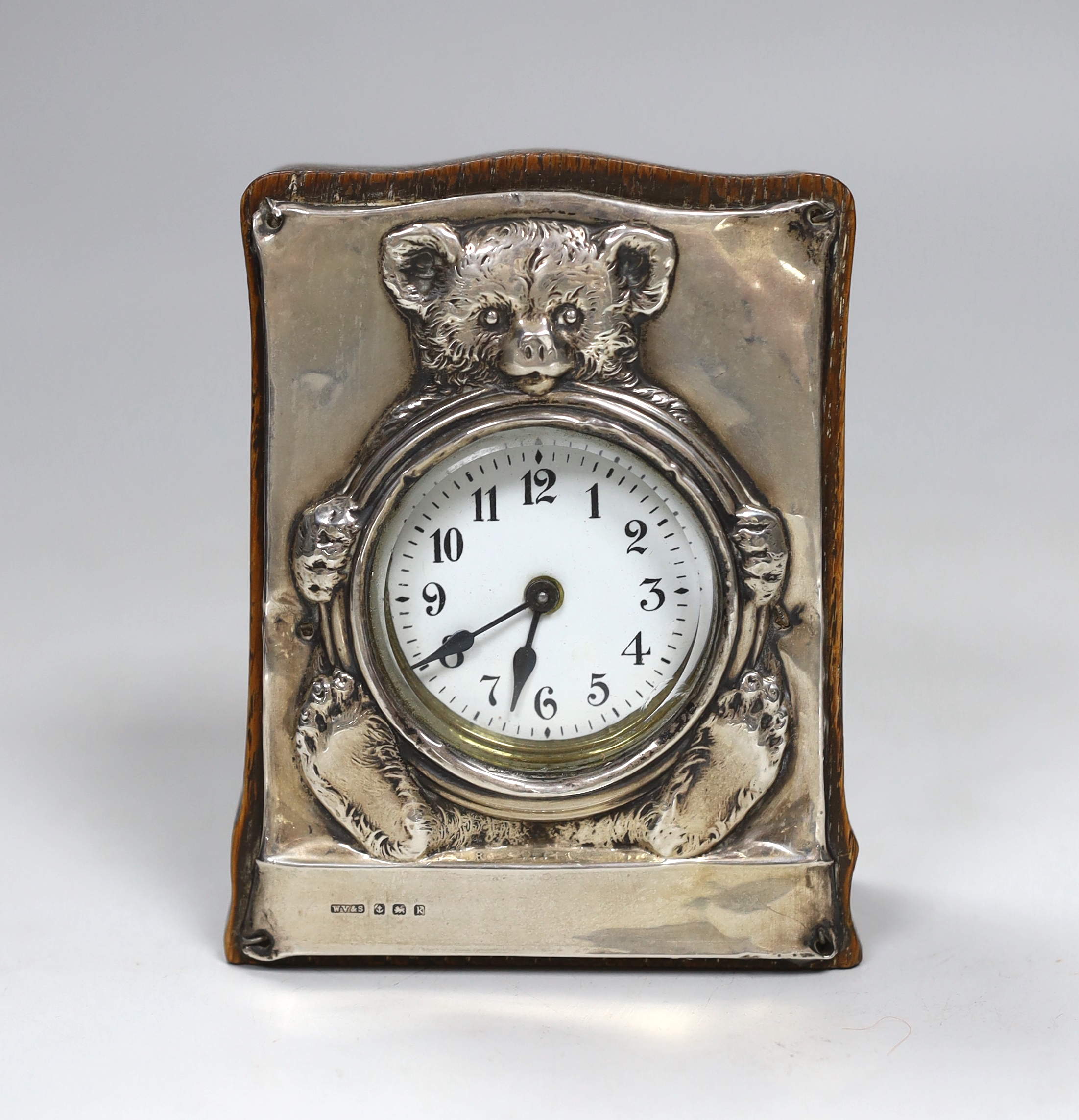 A rare silver teddy bear clock, Birmingham 1909 hallmarked, 5in.